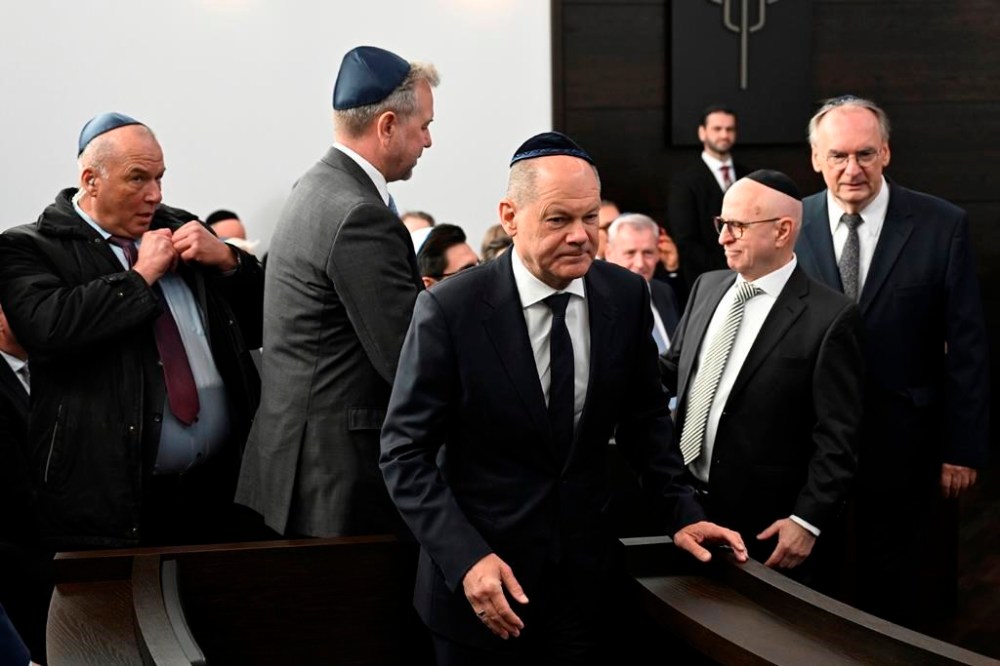 German Chancellor Olaf Scholz attends the inauguration of the newly built synagogue in Dessau, Germany, Sunday, Oct. 22, 2023. Scholz said Germany will do everything to protect and strengthen Jewish life in his remarks at the inauguration of the Weill Synagogue in Dessau. (Hendrik Schmidt/Pool Photo via AP)