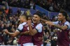 Aston Villa's Leon Bailey, center, celebrates with teammates after scoring his side's fourth goal during the English Premier League soccer match between Aston Villa and West Ham United at Villa Park in Birmingham, England, Sunday, Oct. 22, 2023. (AP Photo/Rui Vieira)