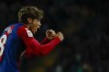 Barcelona's Marc Guiu celebrates after scoring his side's opening goal during a Spanish La Liga soccer match between Barcelona and Athletic Bilbao, at the Olympic Stadium of Montjuic in Barcelona, Spain, Sunday, Oct. 22, 2023. (AP Photo/Joan Monfort )