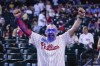 A Philadelphia Phillies fan celebrates before Game 3 of the baseball NL Championship Series against the Arizona Diamondbacks in Phoenix, Thursday, Oct. 19, 2023. (AP Photo/Ross D. Franklin)