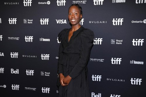 Leslie Norville arrives on the red carpet to promote 