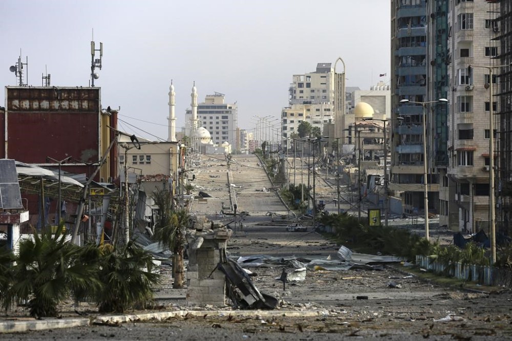 Part of the damage on al Rashid main Street caused by Israeli bombardment on Gaza City, Monday, Oct. 23, 2023. (AP Photo/Abed Khaled)