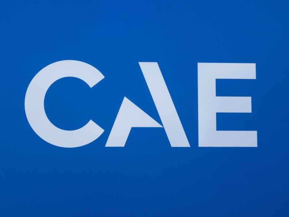 The CAE logo is seen at the aeropspace company’s plant, Thursday, July 21, 2022 in Montreal. CAE Inc. has signed a deal sell its health-care business to U.S. company Madison Industries for $311 million.THE CANADIAN PRESS/Ryan Remiorz