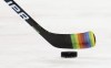 FILE - Zac Jones of the New York Rangers skates with a stick decorated for 
