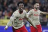 Lens' Elye Wahi celebrates after scoring his side's opening goal during the Champions League, Group B soccer match between Lens and PSV Eindhoven at the Bollaert-Delelis stadium in Lens, northern France, Tuesday, Oct. 24, 2023. (AP Photo/Michel Spingler)