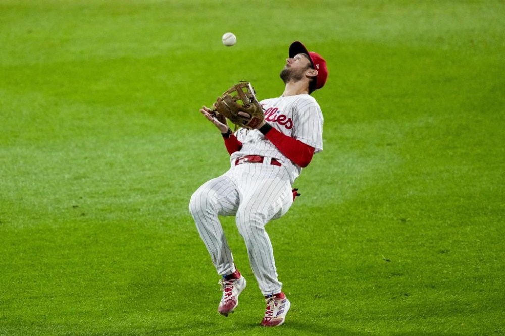 Philadelphia Phillies shortstop Trea Turner catches a fly ball from Arizona Diamondbacks' Lourdes Gurriel Jr. during the eighth inning in Game 7 of the baseball NL Championship Series in Philadelphia Tuesday, Oct. 24, 2023. (AP Photo/Matt Rourke)