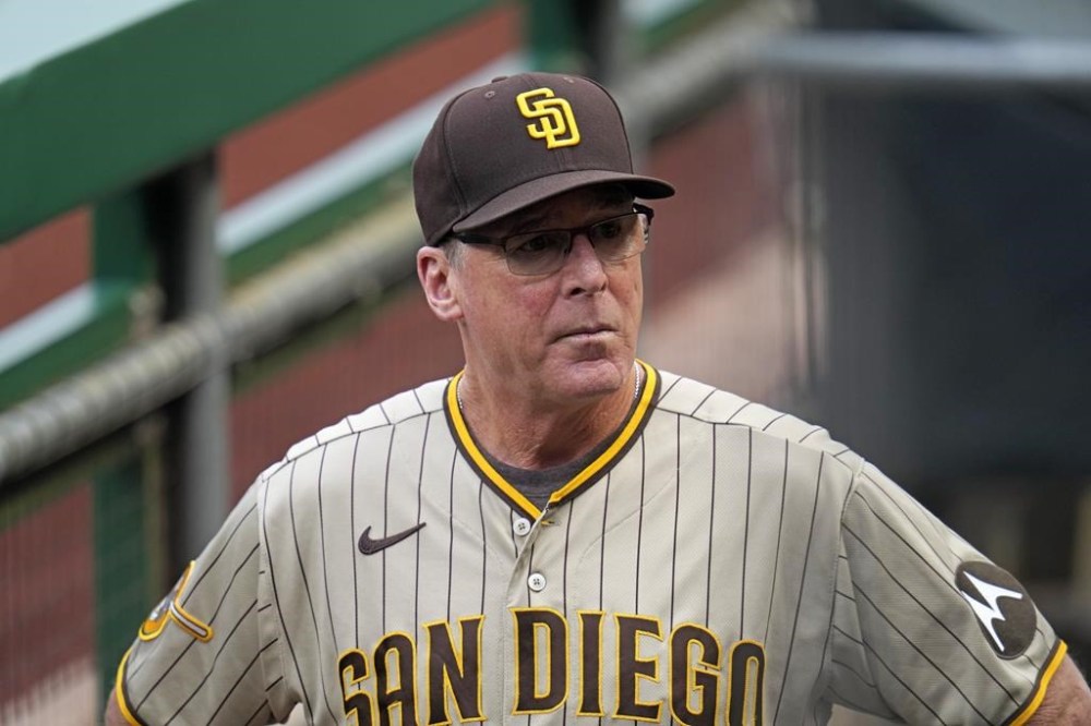 FILE - San Diego Padres manager Bob Melvin stands in the dugout before a baseball game against the Pittsburgh Pirates in Pittsburgh, Wednesday, June 28, 2023. The San Francisco Giants have hired manager Bob Melvin away from the division rival San Diego Padres, three people with direct knowledge of the situation said Tuesday, Oct. 24, 2023. The people spoke to The Associated Press on condition of anonymity because they were not authorized to discuss the move publicly. (AP Photo/Gene J. Puskar, File)