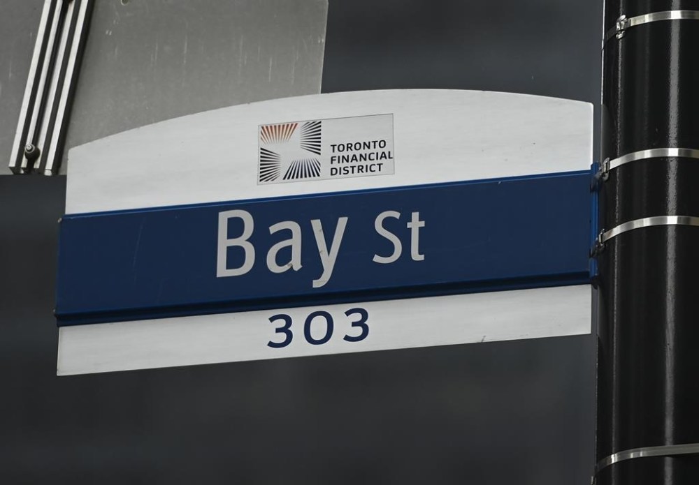 A street sign along Bay Street in Toronto's financial district is shown on Tuesday, January 12, 2021. THE CANADIAN PRESS/Nathan Denette
