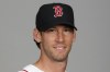 FILE -This is a 2015 photo of Craig Breslow of the Boston Red Sox baseball team. The Boston Red Sox have hired ex-pitcher Craig Breslow to run their baseball operations department, a team official said Wednesday, Oct. 25, 2023. (AP Photo/Tony Gutierrez, File)