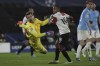 Lazio's goalkeeper Ivan Provedel jumps as Feyenoord's Ramiz Zerrouki, unseen in the picture, scores his side's second goal during the Champions League, Group E soccer match between Feyenoord and Lazio, at the Feyenoord stadium, in Rotterdam, Netherlands, Wednesday, Oct. 25, 2023. (AP Photo/Patrick Post)