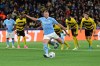 Manchester City's Erling Haaland shoots a penalty shot to score, during the Champions League group G soccer match between BSC Young Boys and Manchester City, at the Wankdorf stadium, in Bern, Switzerland, Wednesday, Oct. 25, 2023. (Anthony Anex/Keystone via AP)