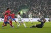 Celtic's Kyogo Furuhashi, centre, scores his side's first goal of the game, during the Champions League Group E match between Celtic Glasgow and Atletico Madrid, at Celtic Park, in Glasgow, Scotland, Wednesday, Oct. 25, 2023. (Andrew Milligan/PA via AP)