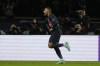 PSG's Kylian Mbappe celebrates after scoring his side's opening goal during the Champions League group F soccer match between Paris Saint Germain and AC Milan at Parc des Princes stadium in Paris, Wednesday, Oct. 25, 2023. (AP Photo/Thibault Camus)