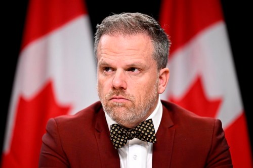 Minister of Health Mark Holland listens during a news conference at the National Press Theatre in Ottawa on Thursday, Oct. 19, 2023.&nbsp;Medically assisted deaths jumped by 31 per cent in Canada last year as part of a continuing trend since the practice was legalized in 2016 for those with a serious and incurable illness or disability, a federal report says. THE CANADIAN PRESS/Justin Tang