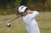 Gaby Lopez of Mexico watches her tee shot on the third hole during the first round of the BMW Ladies Championship at the Seowon Hills Country Club in Paju, South Korea, Thursday, Oct. 19, 2023. (AP Photo/Lee Jin-man)
