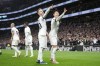 Tottenham's James Maddison, centre, celebrates with Tottenham's Son Heung-min after scoring his side's second goal during the English Premier League soccer match between Tottenham Hotspur and Fulham at the Tottenham Hotspur Stadium in London, Monday, Oct. 23, 2023. (AP Photo/Kin Cheung)
