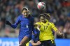 U.S. forward Trinity Rodman heads the ball as Colombia's Caroline Arias (17) defends during the first half of an international friendly soccer match Thursday, Oct. 26, 2023, in Sandy, Utah. (AP Photo/Rick Bowmer)