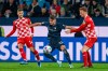 Bochum's Moritz Broschinski is challenged by Tom Krauss, left, and Sepp van den Berg of Mainz during the Bundesliga soccer match between VfL Bochum and FSV Mainz 05 at Vonovia Ruhrstadion, Bochum, Germany, Friday Oct. 27, 2023. (David Inderlied/dpa via AP)