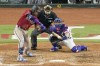 Arizona Diamondbacks' Ketel Marte hits a RBI double off Texas Rangers starting pitcher Nathan Eovaldi during the fifth inning in Game 1 of the baseball World Series Friday, Oct. 27, 2023, in Arlington, Texas. (AP Photo/Tony Gutierrez)