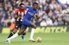 Chelsea's Nicolas Jackson, front, duels for the ball with Brentford's Ethan Pinnock during the English Premier League soccer match between Chelsea and Brentford at Stamford Bridge stadium in London, Saturday, Oct. 28, 2023. (AP Photo/Ian Walton)
