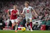 Arsenal's Oleksandr Zinchenko and Sheffield United's Ben Osborn challenge for the ball during the English Premier League soccer match between Arsenal and Sheffield United at Emirates Stadium in London, Saturday, Oct. 28, 2023.(AP Photo/Kirsty Wigglesworth)