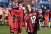 Canada forward Christine Sinclair, left, exchanges jerseys with hockey player Marie-Philip Poulin prior to a friendly international soccer match against Brazil, Saturday Oct. 28, 2023 in Montreal. THE CANADIAN PRESS/Christinne Muschi