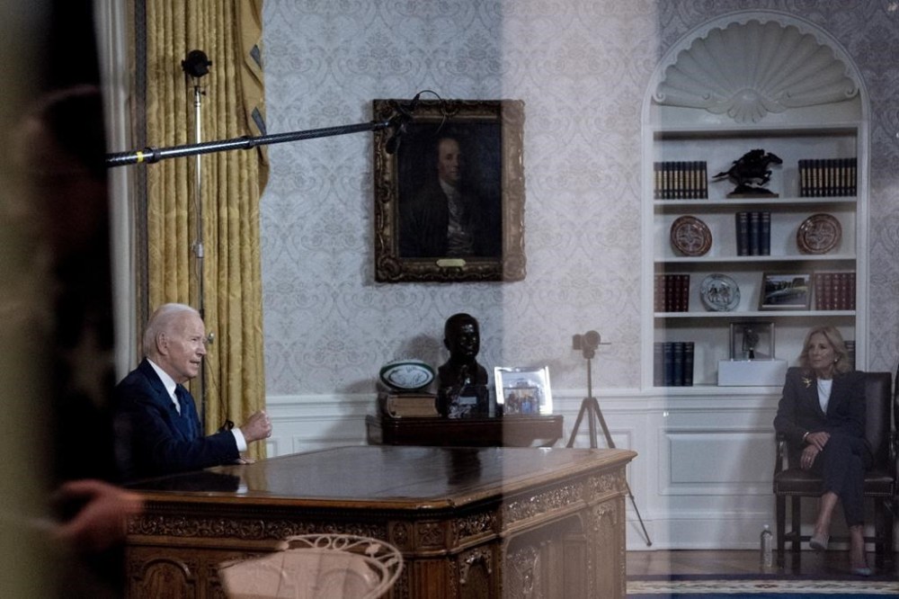FILE - First lady Jill Biden, right, watches as President Joe Biden speaks from the Oval Office of the White House, Thursday, Oct. 19, 2023, in Washington, about the war in Israel and Ukraine. (AP Photo/Andrew Harnik, File)