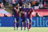 Barcelona's Ilkay Gundogan, centre, celebrates with Barcelona's Ferran Torres, left, and Barcelona's Gavi after scoring his side's opening goal during the La Liga soccer match between Barcelona and Real Madrid at the Olympic Stadium in Barcelona, Spain, Saturday, Oct. 28, 2023. (AP Photo/Joan Monfort)