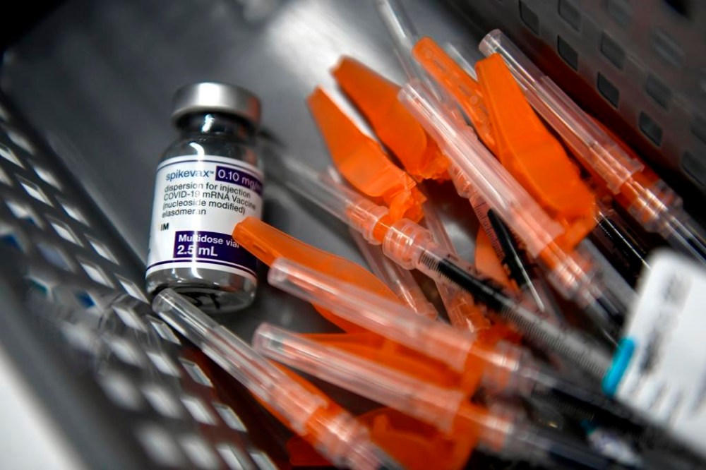 People in Ontario who are six months and older will be able to receive their free flu shot and the new COVID-19 vaccine starting on Monday. Pediatric doses of Moderna's Spikevax COVID-19 vaccine are seen a clinic in Ottawa, on Wednesday, Nov. 23, 2022. THE CANADIAN PRESS/Justin Tang