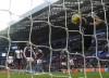 Aston Villa goalkeeper Emiliano Martinez scores an own goal, Luton Town's first goal of the game,, during the English Premier League soccer match between Aston Villa and Luton Town at Villa Park, in Birmingham, England, Sunday Oct. 29, 2023. (Jacob King/PA via AP)