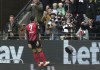 Frankfurt's Omar Marmoush celebrates his side's second goal during a German Bundesliga soccer match between Eintracht Frankfurt and Borussia Dortmund in Frankfurt, Germany, Sunday, Oct. 29, 2023. (AP Photo/Michael Probst)