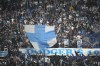 Marseille fans wait for the start of the French League One soccer match between Olympique de Marseille and Lyon at the Velodrome Stadium, in Marseille, France, Sunday, Oct. 29, 2023. (AP Photo/Daniel Cole)