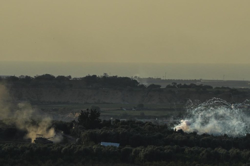 The Canadian Armed Forces says it has sent special forces to Ottawa's embassy in Tel Aviv to help guide Canada's response to volatility in the region. An Israeli tank operates in the Gaza Strip, as seen from southern Israel, Monday, Oct. 30, 2023. THE CANADIAN PRESS/AP-Tsafrir Abayov