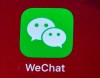 Icon for the smartphone apps WeChat is shown on a smartphone screen in Beijing, on Aug. 7, 2020. The federal government is banning WeChat and Kaspersky applications from its phones over security concerns. THE CANADIAN PRESS/AP/Mark Schiefelbein