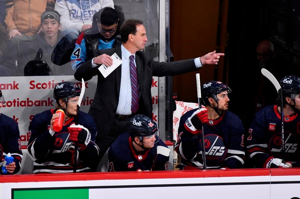 Winnipeg Jets interim head coach Scott Arniel says he expects the NHL to look into the use of increased neck protection after former NHL player Adam Johnson died from a cut by a skate blade during a game in England on Saturday. Arniel gestures to players against the St. Louis Blues during the third period of NHL action in Winnipeg, Tuesday, Oct. 24, 2023. THE CANADIAN PRESS/Fred Greenslade