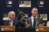 New York Yankees' Aaron Judge, right, speaks as Major League Baseball commissioner Rob Manfred looks on after Judge was named the 2023 Recipient of the Roberto Clemente Award before Game 3 of the baseball World Seriesbetween the Arizona Diamondbacks and the Texas Rangers Monday, Oct. 30, 2023, in Phoenix. (AP Photo/Ross D. Franklin)