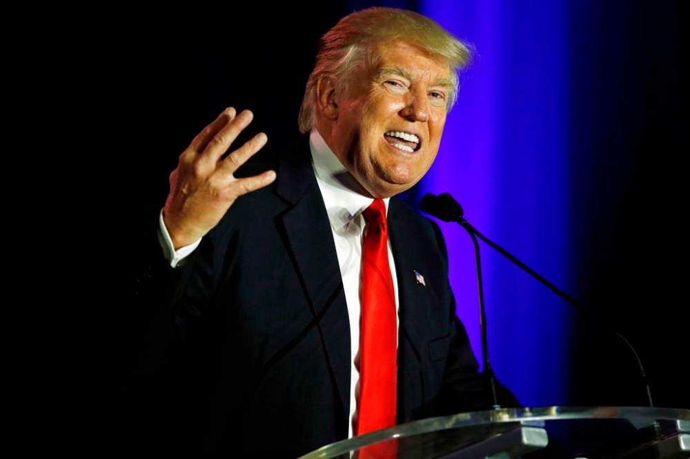 FILE - Donald Trump addresses the Republican Leadership Conference, May 30, 2014, in New Orleans. When Trump tried to buy the Buffalo Bills in 2014, investment bankers doubted the NFL would allow it but encouraged him to stay in the running, according to internal emails aired at the former president's civil fraud trial Tuesday, Oct. 31, 2023. (AP Photo/Bill Haber, File)