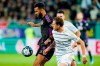 Bayern's Eric Maxim Choupo-Moting, left, and Saarbruecken's Marcel Gaus battle for the ball during the German Soccer Cup second round soccer match between FC Saarbruecken and Bayern Munich at the Ludwigspark Stadium in Saarbruecken, Germany, Wednesday, Nov. 1, 2023. (Uwe Anspach/dpa via AP)