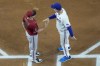 Arizona Diamondbacks manager Torey Lovullo and Texas Rangers manager Bruce Bochy meet at the plate before Game 1 of the baseball World Series Friday, Oct. 27, 2023, in Arlington, Texas. (AP Photo/Godofredo A. Vásquez)