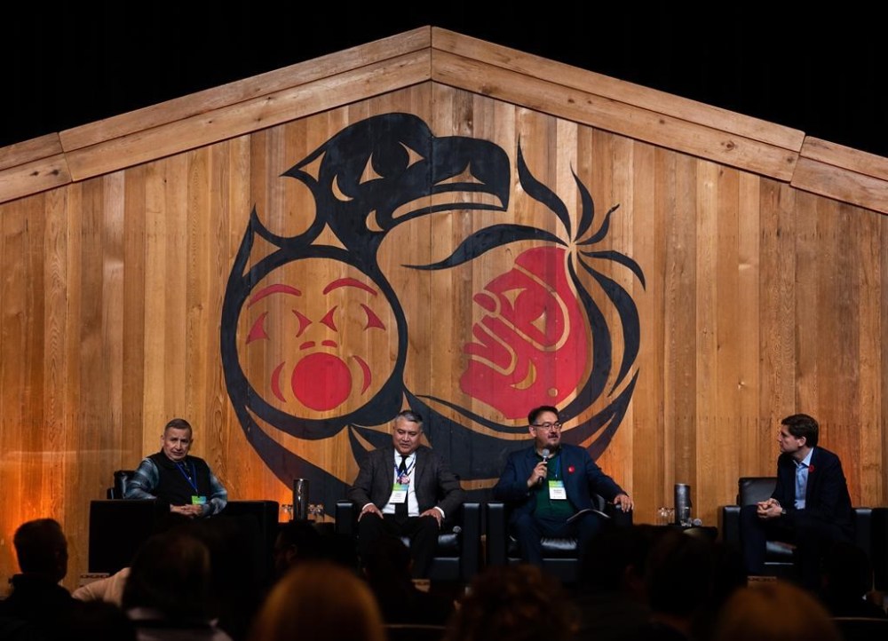 Grand Chief Stewart Phillip, Regional Chief Terry Teegee, Robert Phillips, and B.C. Premier David Eby, left to right, speak during the 2023 B.C. Cabinet and First Nations Leaders’ Gathering in Vancouver, on Thursday, Nov. 2, 2023. THE CANADIAN PRESS/Ethan Cairns