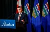 The Alberta government has introduced legislation promising citizens will get a say in a referendum on leaving the Canada Pension Plan. Alberta finance minister Nate Horner speaks to the media at a news conference in Calgary on Thursday, June 29, 2023. THE CANADIAN PRESS/Jeff McIntosh