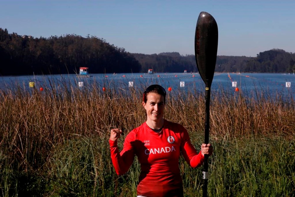Canada's Michelle Russell celebrates after winning the women’s 500-metre kayak event at the Pan Am Games in the San Pedro de la Paz lagoon southwest of Santiago, Chile on Friday, Nov. 3, 2023. THE CANADIAN PRESS/HO-Pan Am Games-Marco Vazquez **MANDATORY CREDIT**