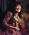 Singer Buffy Sainte-Marie smiles as she accepts the Hall of Fame award at the Juno Awards ceremony in Hamilton on Sunday, March 26, 1995. THE CANADIAN PRESS/Scott Gardner