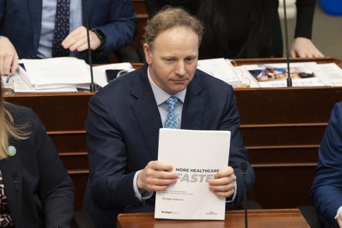 Finance Minister Allan MacMaster arranges his documents at the Nova Scotia legislature in Halifax on Thursday, March 23, 2023. MacMaster says his province and several others made it clear during a virtual call with federal Finance Minister Chrystia Freeland that the federal carbon pricing scheme should be eliminated.THE CANADIAN PRESS/Darren Calabrese
