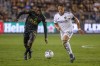 FILE - LA Galaxy forward Javier Hernández (14) and Los Angeles FC defender Jesus David Murillo (3) chase the ball during the second half of an MLS playoff soccer match Oct. 20, 2022, in Los Angeles. Hernández won’t return to the Galaxy next year. The forward's contract has ended, and the MLS team said Friday, Nov. 3, 2023, it was letting him go. As a result, the Galaxy have opened up a designated roster spot for 2024. (AP Photo/Ringo H.W. Chiu, File)