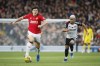 Manchester United's Harry Maguire, left, challenges for the ball with Fulham's Andreas Pereira during the English Premier League soccer match between Fulham and Manchester United, at Craven Cottage, London, Saturday, Nov. 4, 2023. (AP Photo/David Cliff)
