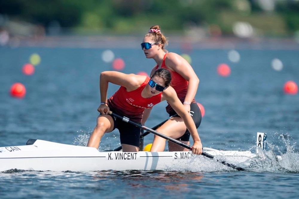 Katie Vincent, left, and teammate Sloan MacKenzie, of Canada, react at the finish line following the C2 women’s 500m during the ICF Canoe Sprint and Paracanoe World Championships in Dartmouth, N.S. on Saturday, August 6, 2022. THE CANADIAN PRESS/Darren Calabrese