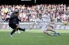 Napoli's Giacomo Raspadori, left, scores, during the Italian Serie A soccer match between US Salernitana and Napoli, at Arechi stadium, in Salerno, Italy, Saturday, Nov. 4, 2023. (Alessandro Garofalo/LaPresse via AP)