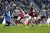 Newcastle United's Callum Wilson shoots towards goal, during the English Premier League soccer match between Newcastle United and Arsenal at St. James' Park, in Newcastle upon Tyne, England, Saturday, Nov. 4, 2023. (Owen Humphreys/PA via AP)