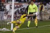 FC Cincinnati goalkeeper Roman Celentano stops a shot by New York Red Bulls' Andres Reyes during penalty kicks in an MLS playoff soccer match in Harrison, N.J., Saturday, Nov. 4, 2023. (AP Photo/Eduardo Munoz Alvarez)